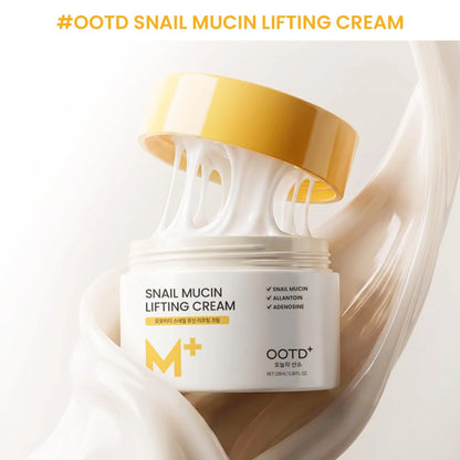 Styled close up of an open #OOTD Snail Mucin Lifting Cream jar with white cream stretching from the yellow lid.