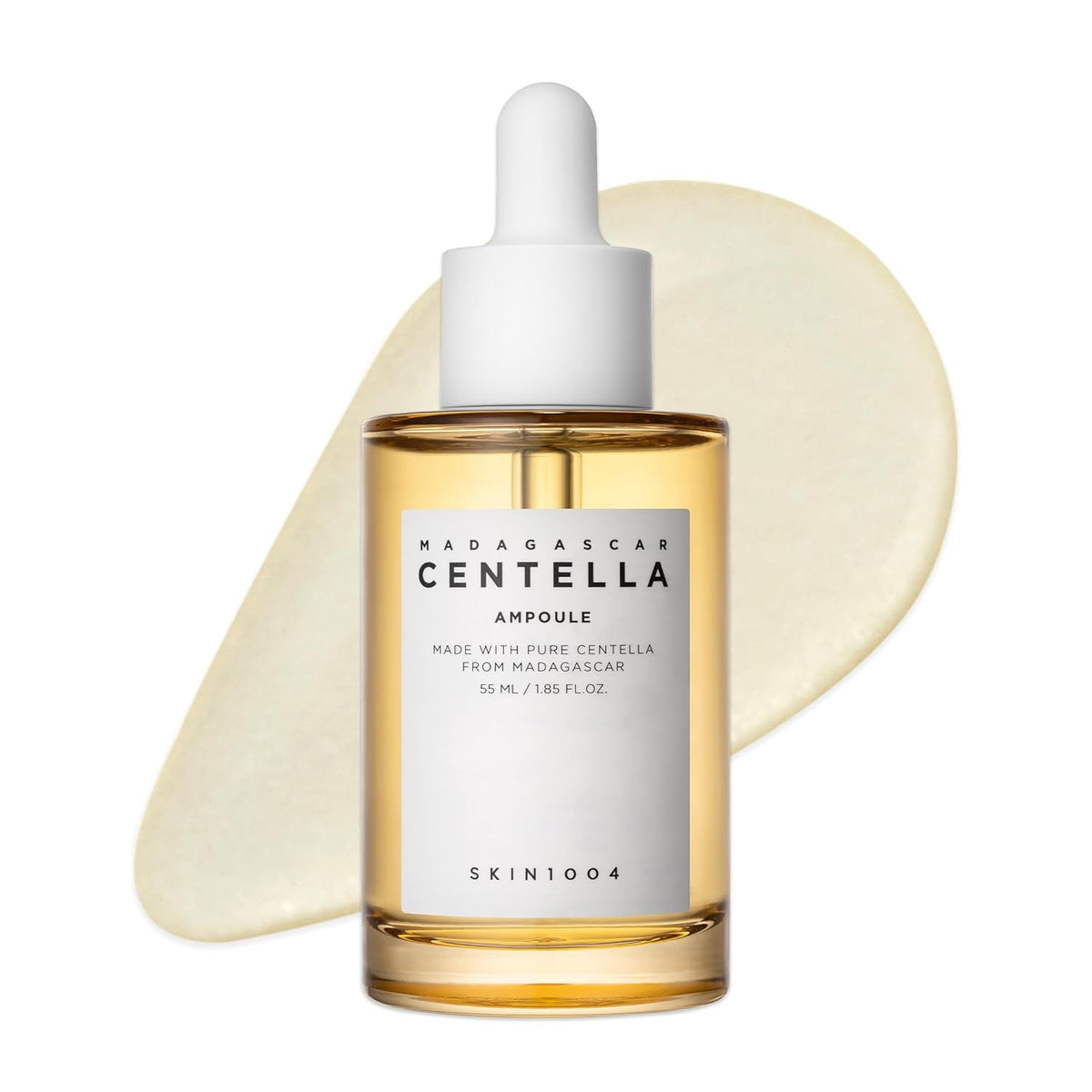 SKIN1004 Madagascar Centella Ampoule 55ml dropper bottle in front of a pale golden serum swatch.