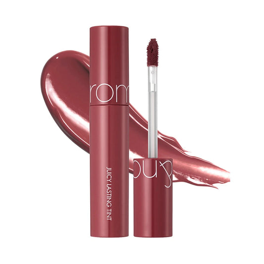 rom&nd Juicy Lasting Tint 19 Almond Rose open tube over a warm rose swatch