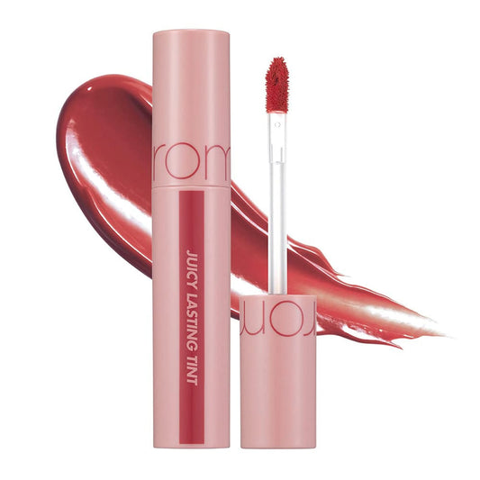rom&nd Juicy Lasting Tint 24 Peeling Angdoo open tube over a berry-red swatch