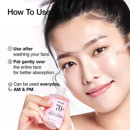 Model applying ANUA Peach serum to her cheek; directions say to use after cleansing, pat gently, morning and night.