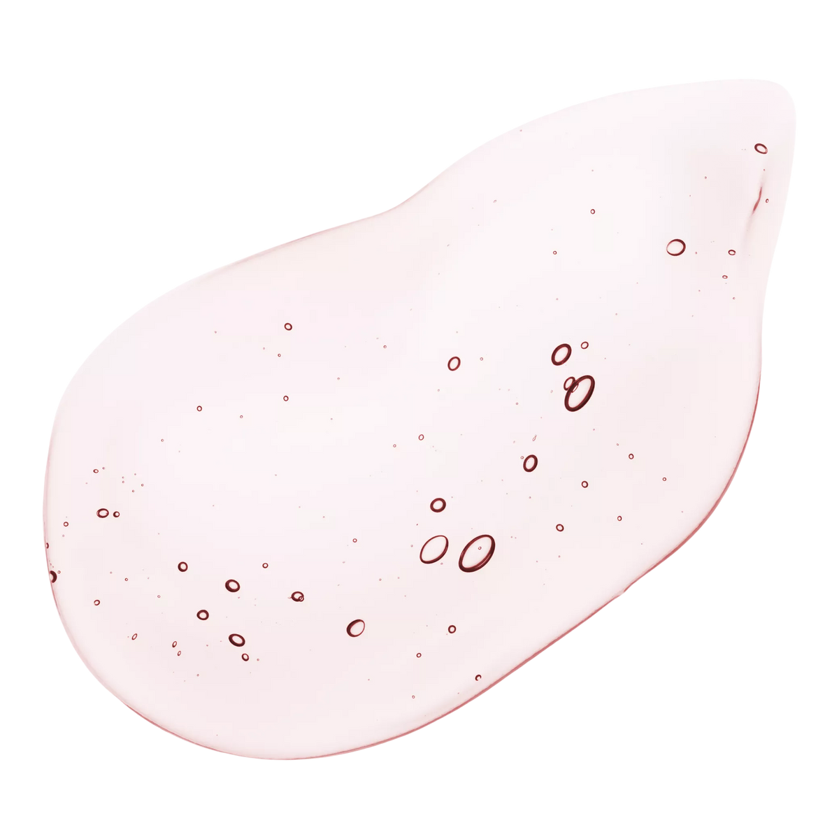 Close-up of a pale pink ANUA Peach serum swatch with small bubbles.