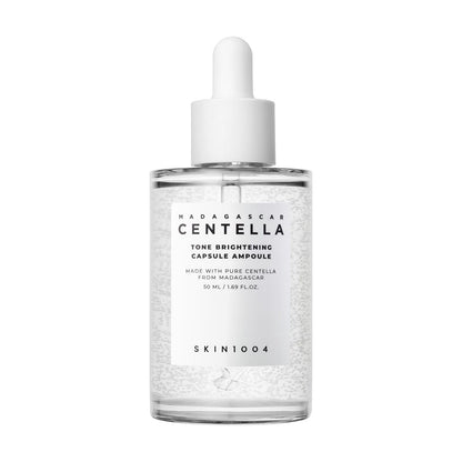 SKIN1004 Madagascar Centella Tone Brightening Capsule Ampoule 50ml bottle with a white dropper and visible capsules.