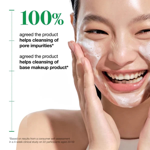 A person washing their face with foam beside a consumer survey claim about cleansing pore impurities and base makeup.
